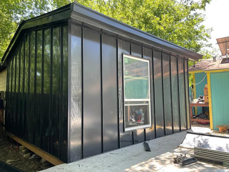 Black standing seam metal wall panels for Metal Roof Installation in Olathe