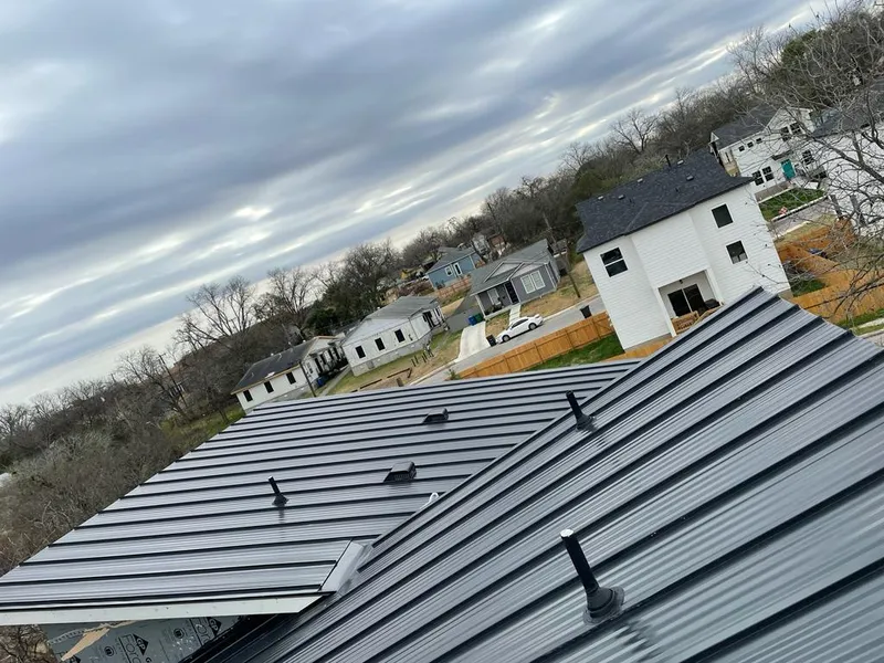 Standing seam metal roof panels with vents for Skylight Repair in Olathe